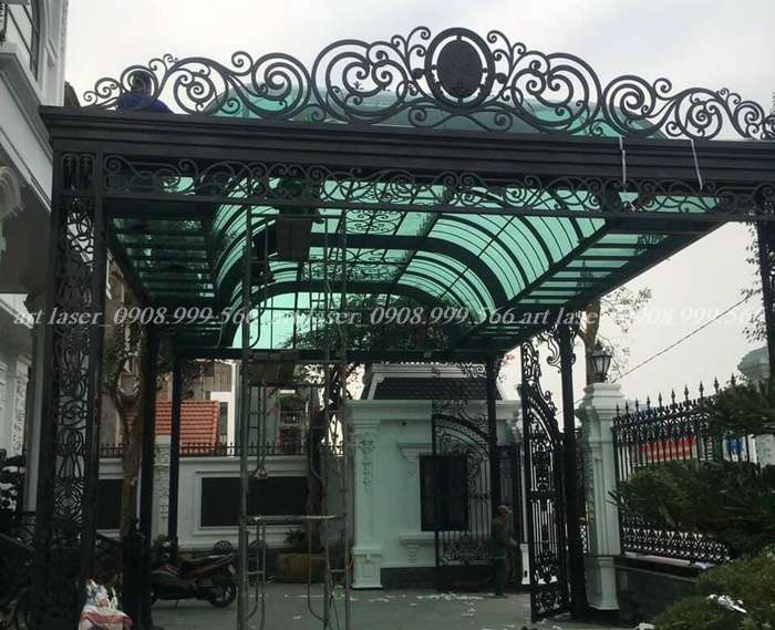 Mái kính cường lực màu xanh lá, khung sắt thiết kế dạng mái vòm
